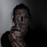 Milla Jovovich on “Protector” A Mother’s War Milla Jovovich in a powerful scene from Protector, the action thriller directed by Adrian Grünberg